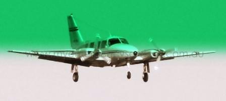 Light twin on approach to regional airport Photograph MJStephenson